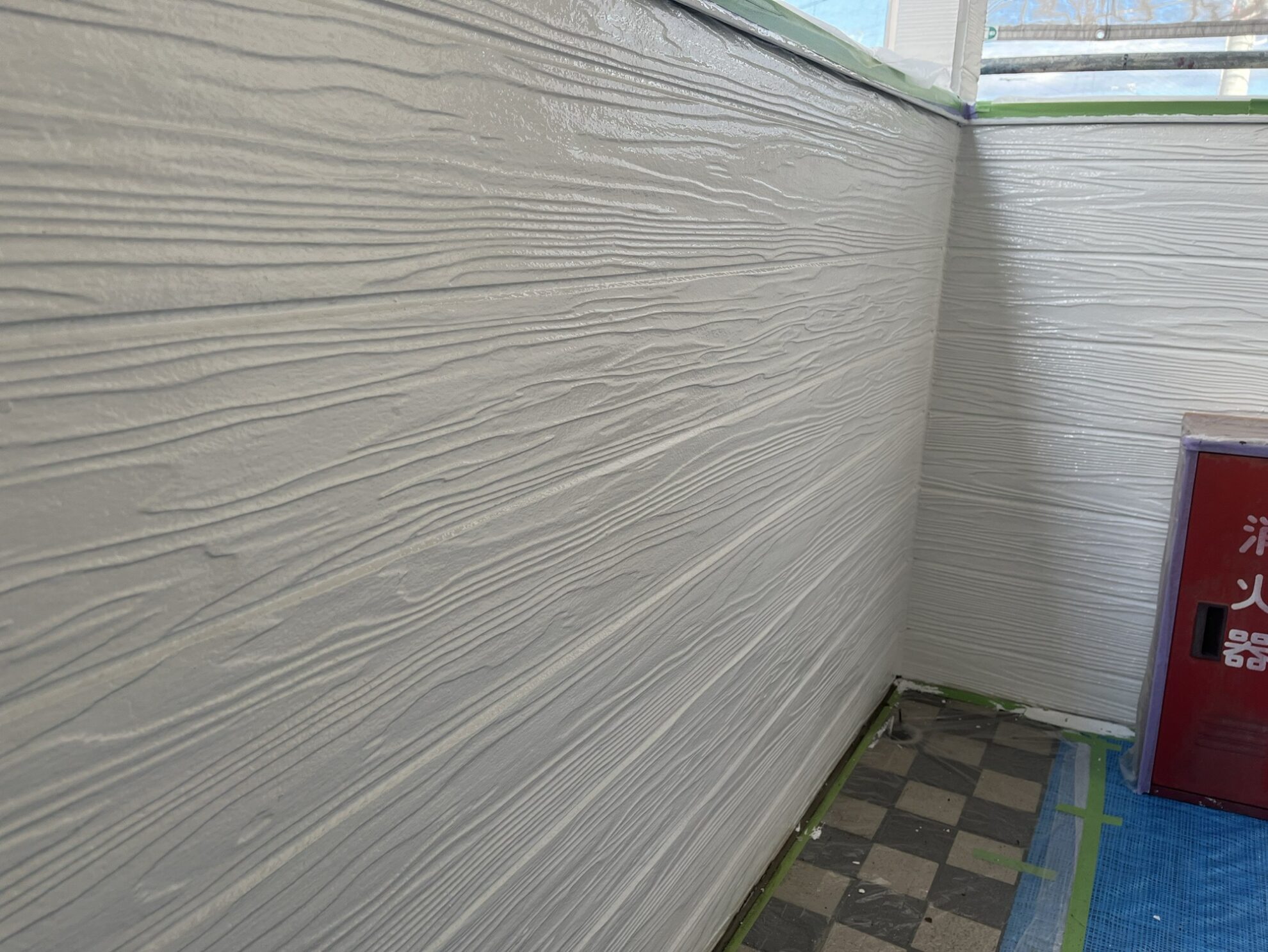 仙台市太白区 アパート外壁塗装 中塗り完了後の外壁の状態